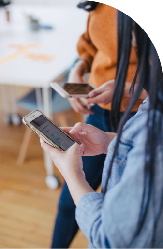 Two women on their phone